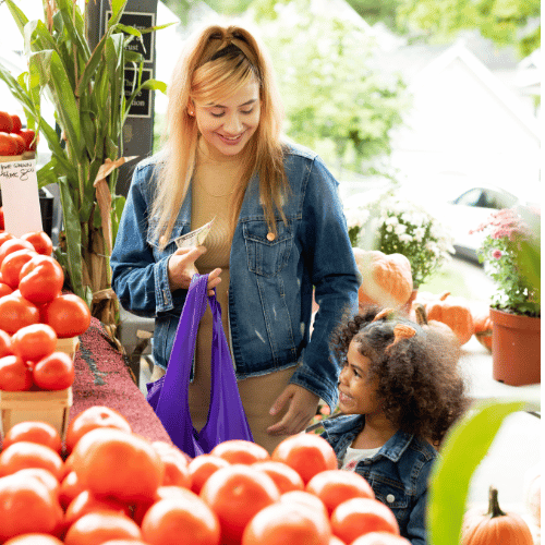 Mom and child at farmers Market 